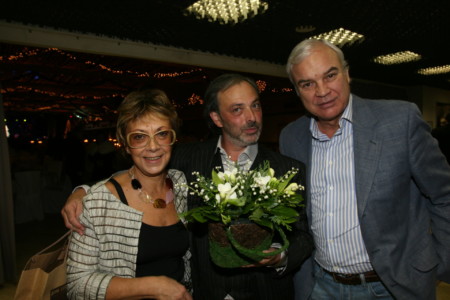 Russian scenograph and designer Boris Krasnov' birthday party. Forum Hall. Moscow. Russia In the picture: Boris Krasnov and TV presenter Vladimir Molchanov with his wife